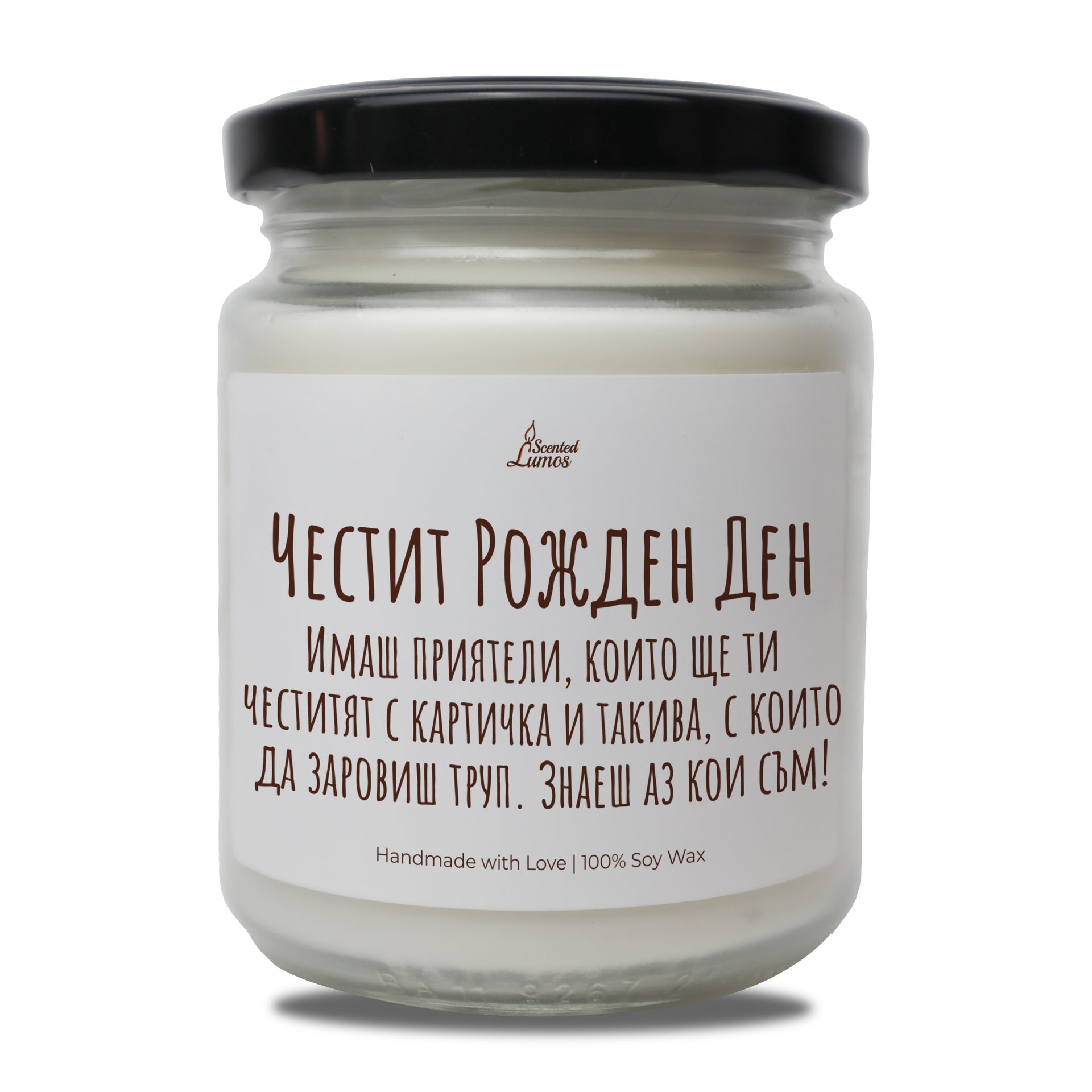 a jar of white candles sitting on top of a table